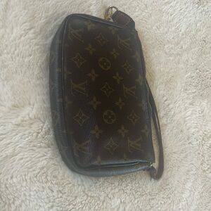 LV Small clutch. Strap can be replaced bag is in great condition.
